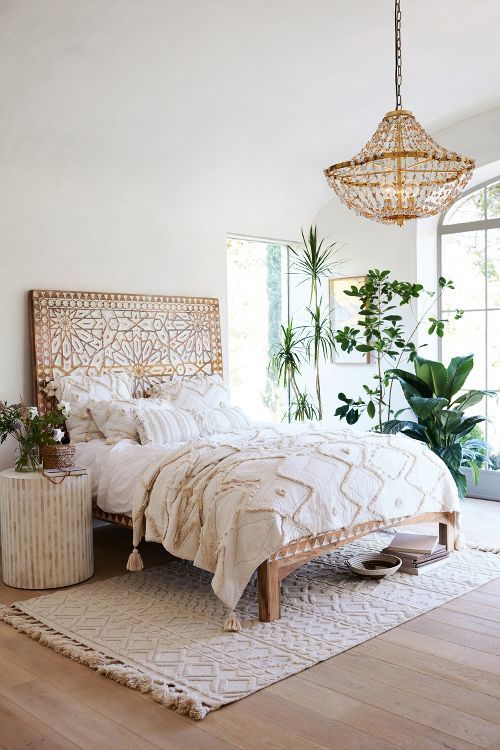 Carved Headboard with Geometric Inlay Adds a Statement