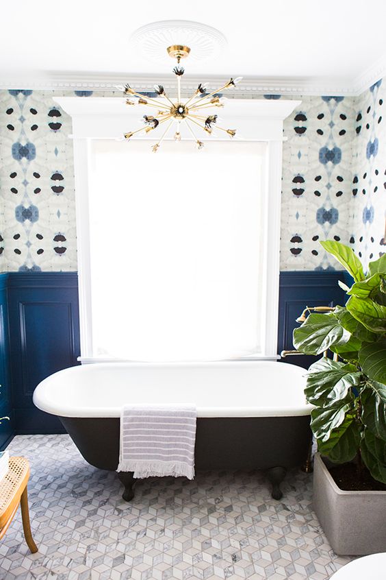 Clawfoot Tub With Patterned Wallpaper Creates a Bold Bathroom