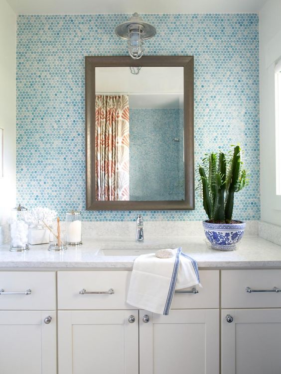 Blue Penny Tile Walls Add a Refreshing Aquatic Tone