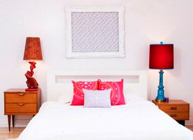 Sculptural Red Lamps Add Artistic Flair To Bedside Tables