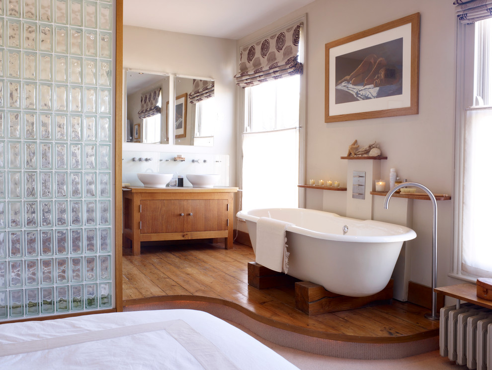 Wooden Blocks Elevate Freestanding Tub
