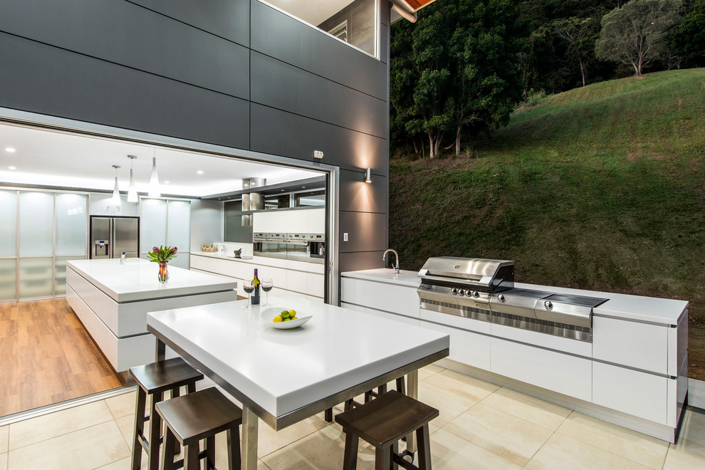 Integrated Outdoor Grill With Sleek White Cabinetry