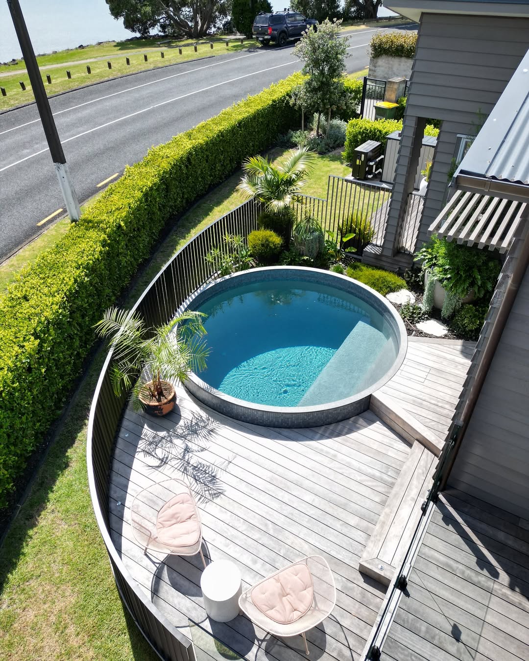 Mirror Your Pool Shape with Curved Decking