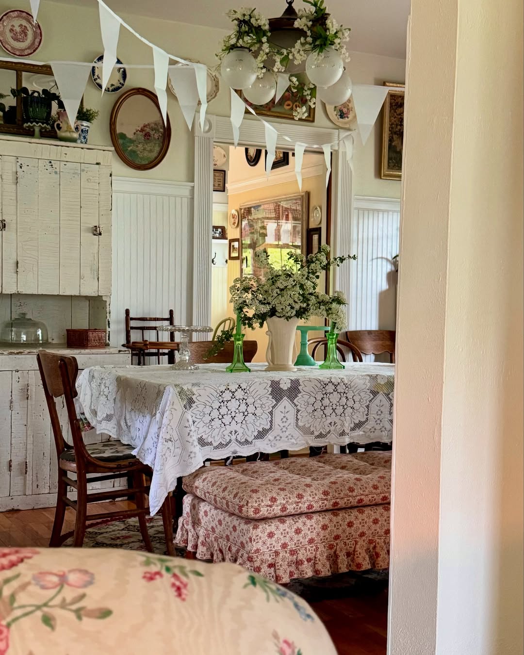 White Bunting Adds Festive Flair Above A Table
