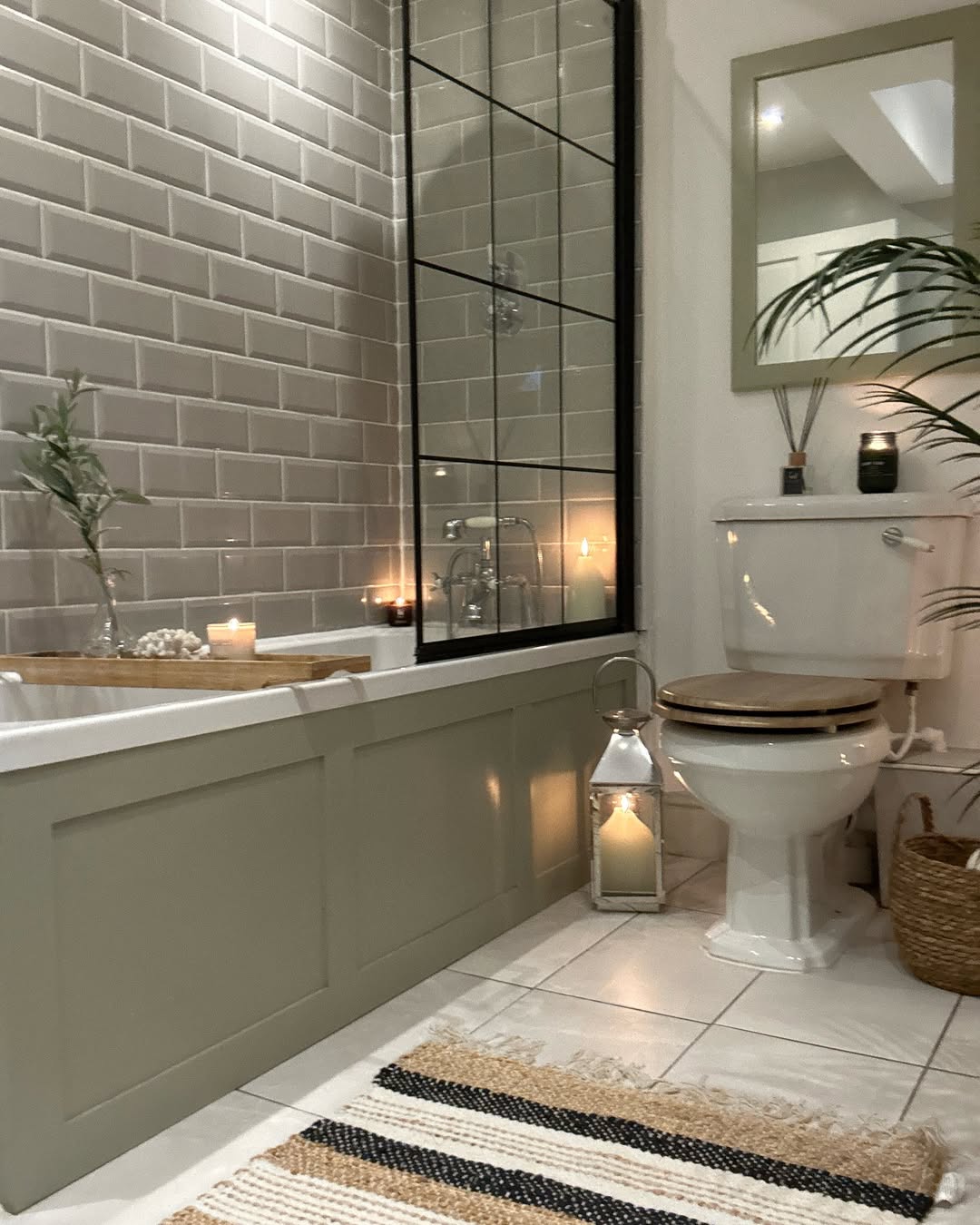 White Lanterns Add Cozy Light Beside the Toilet