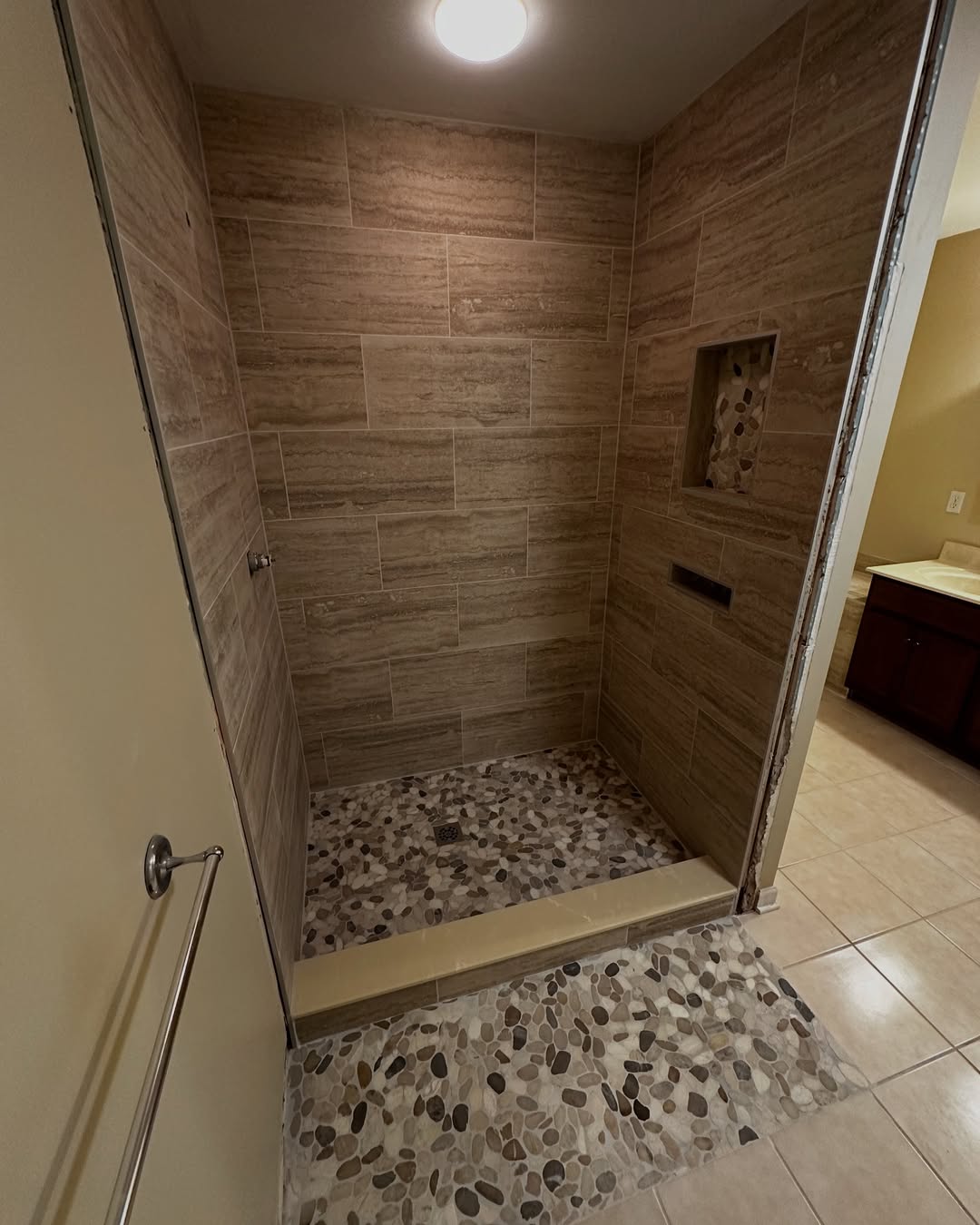 Pebble Floor Tiles Add Natural Texture and Grip