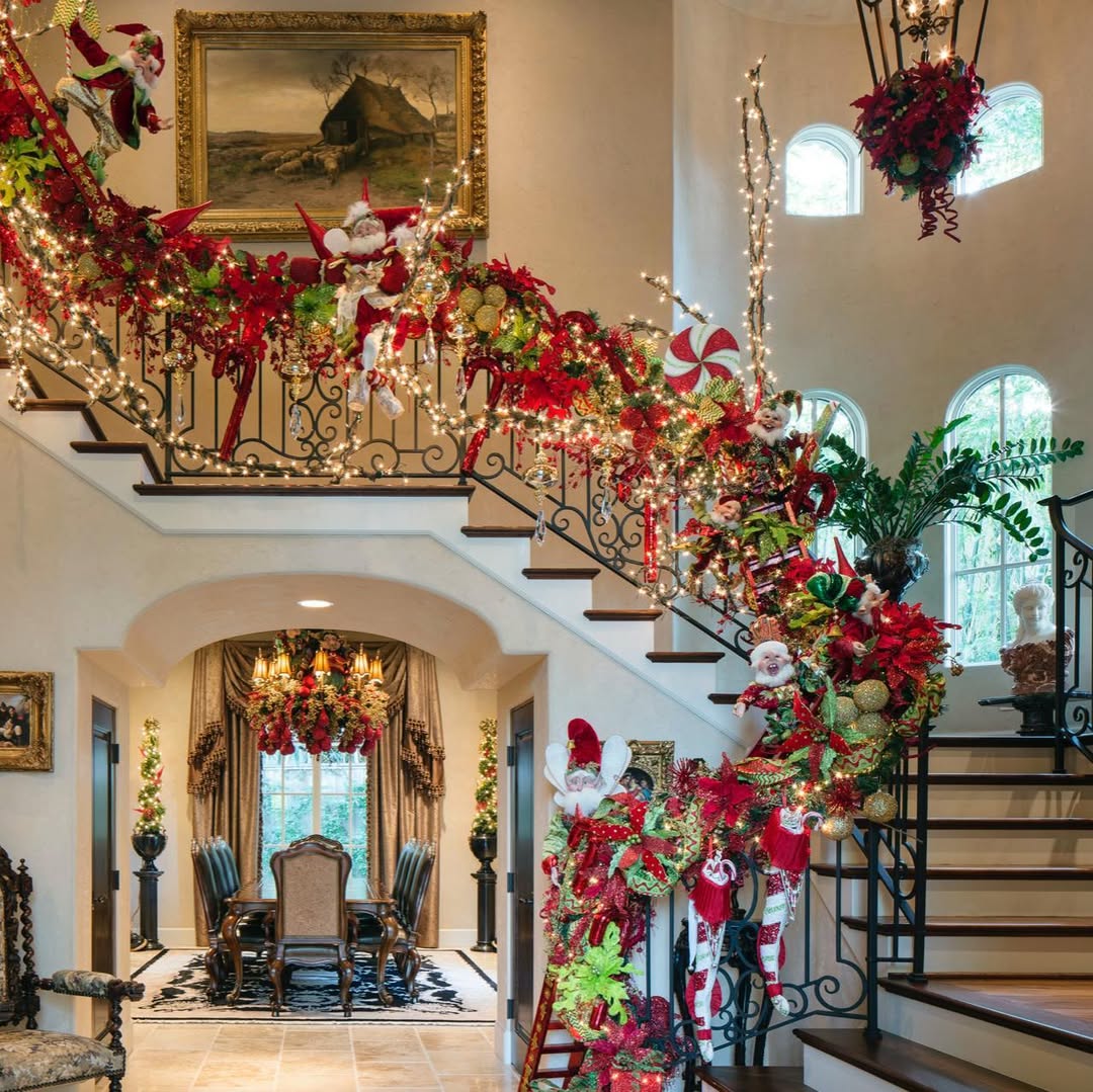 Whimsical Santa and Elf Ornaments Adorn Staircase Garland