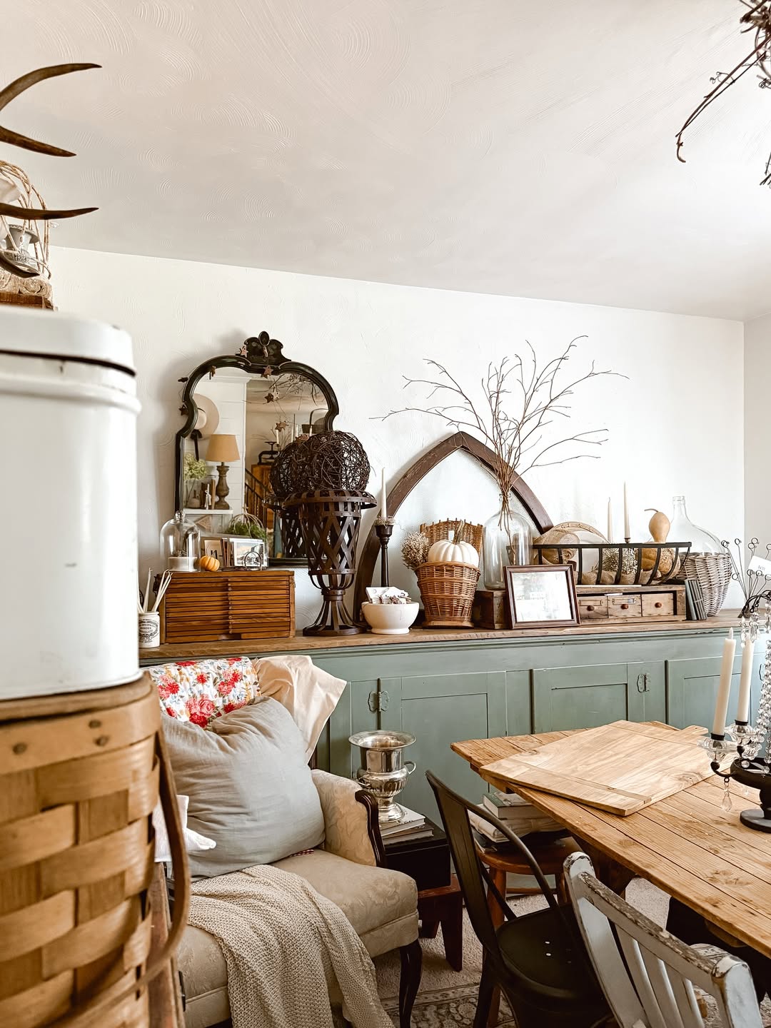 Ornate Mirror Frames a Vignette of Autumnal Accents