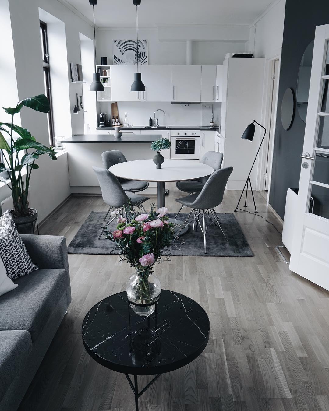 Round Black Marble Table With Floral Centerpiece