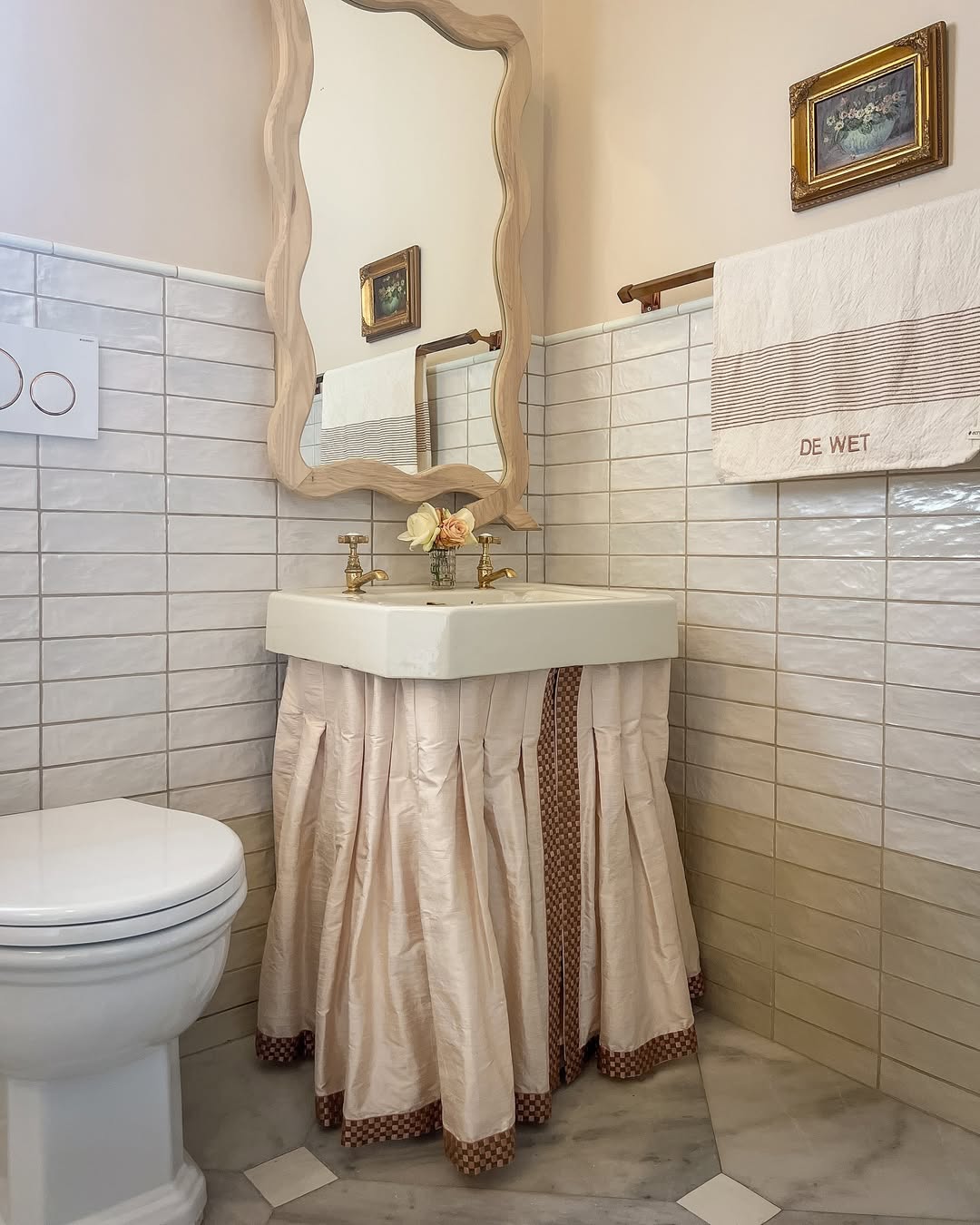 Conceal Plumbing with a Pleated Skirt and Decorative Trim
