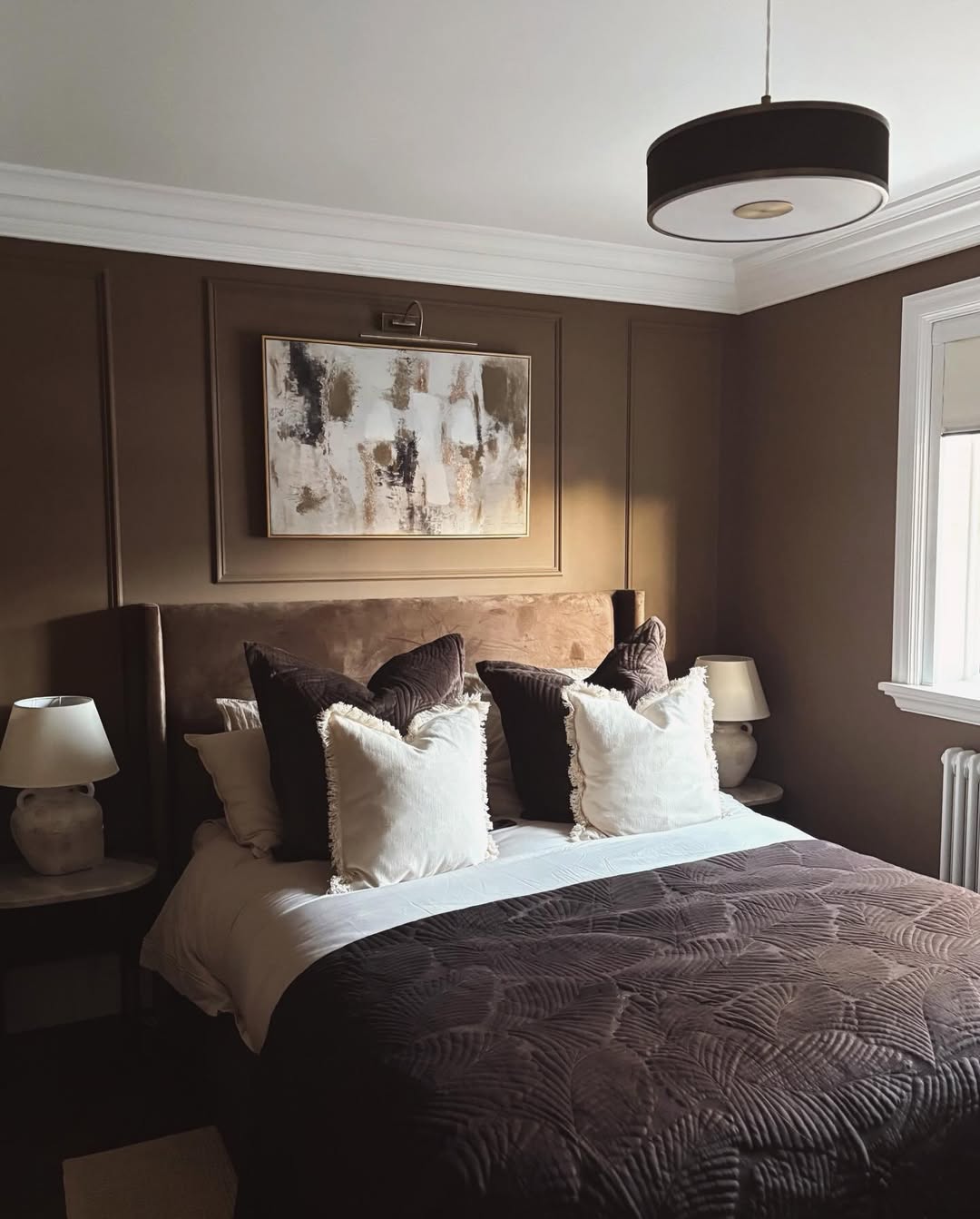 Framed Abstract Art Adds a Layered Focal Point Above the Bed