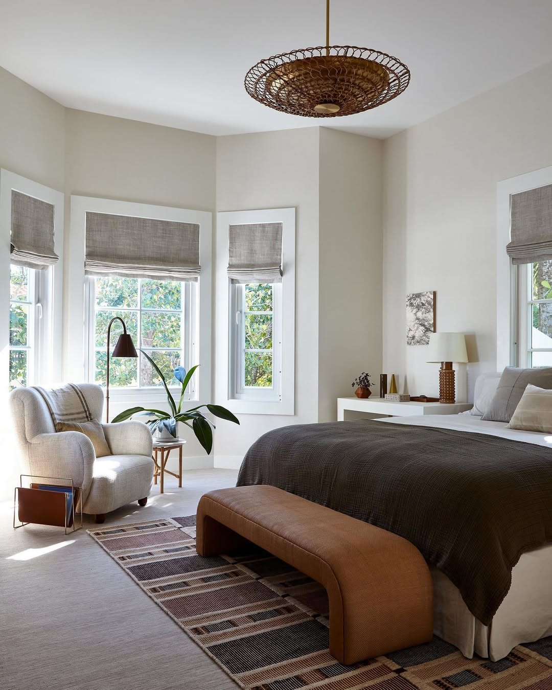 Incorporate a Curved Leather Bench for a Sculptural Element
