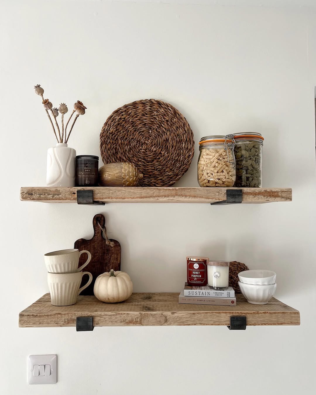 Rustic Shelves Displaying Seasonal Decor and Pantry Staples