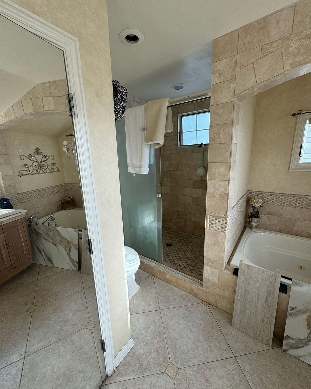 Glass Shower Door Doubles as a Towel Bar