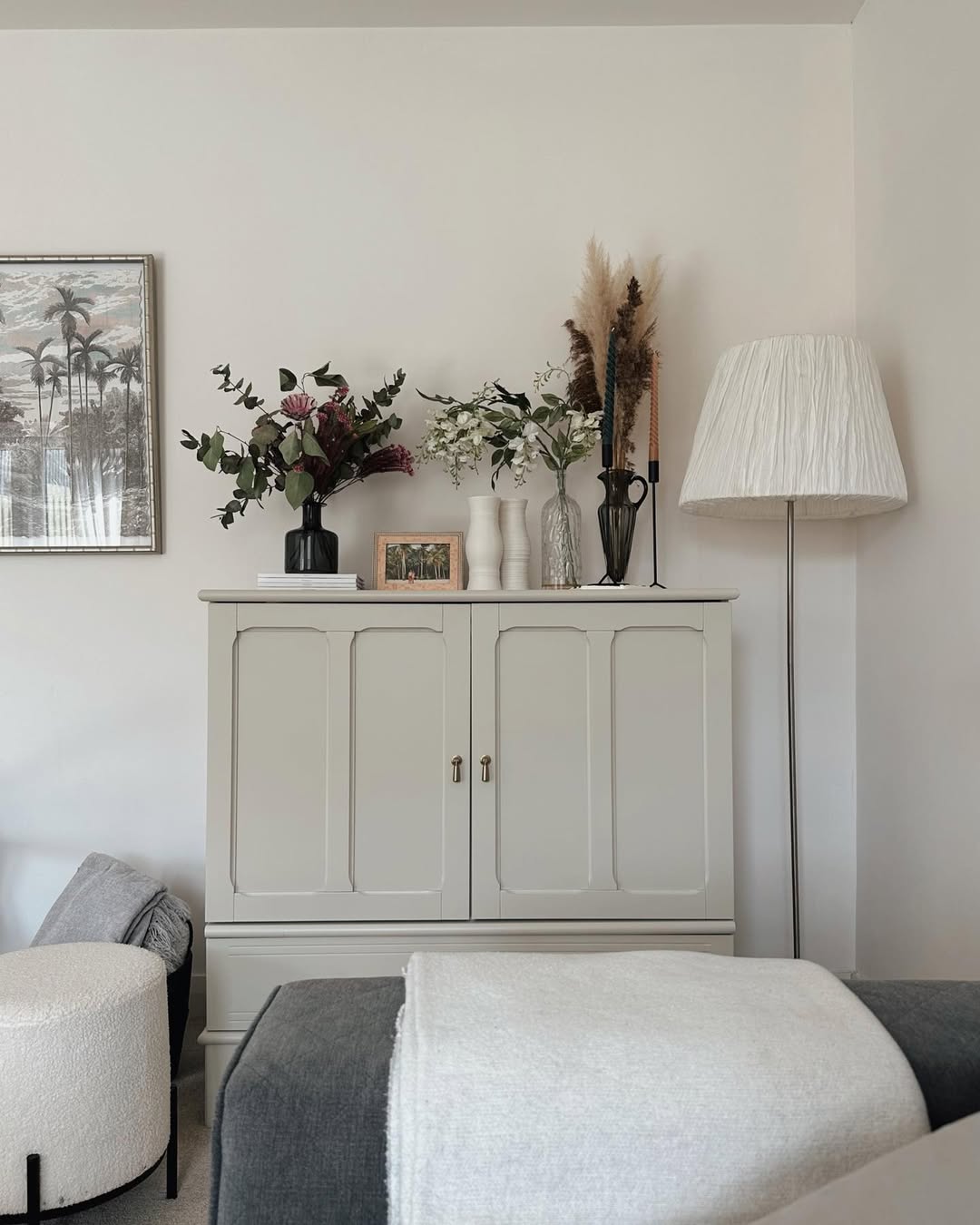 Grouped Vases Add Varying Heights to Sideboard Display