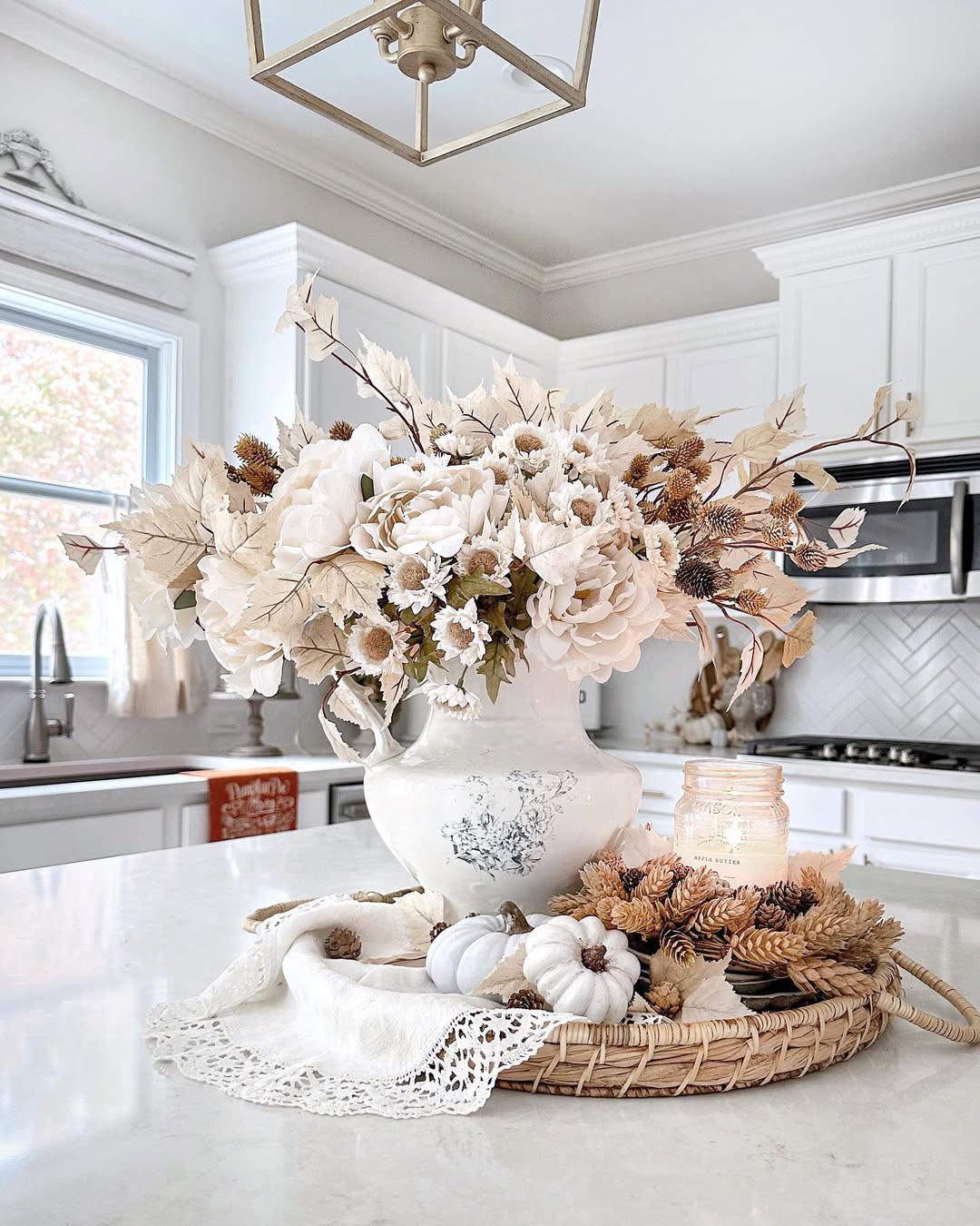 White Pitcher With Dried Botanicals Creates a Neutral Fall Vignette