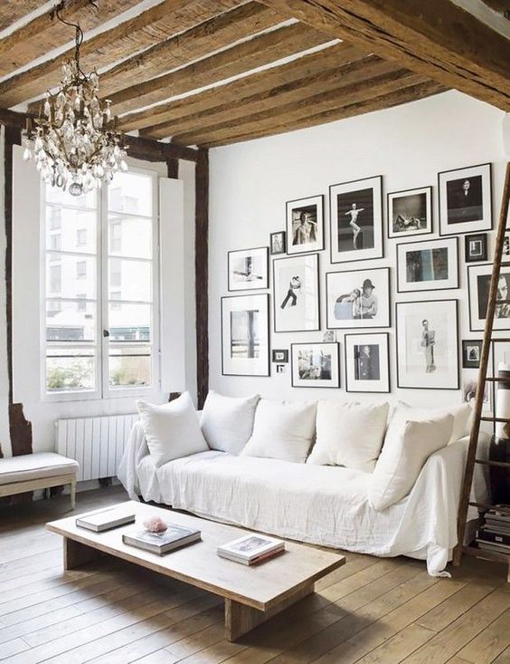 Gallery Wall of Black and White Photos Adds Dynamic Art