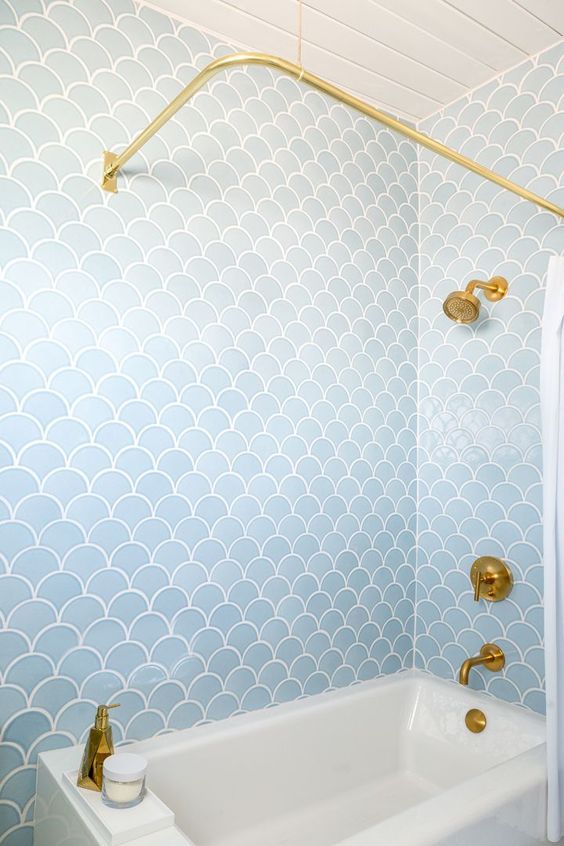 Serene Shower with Scalloped Blue Tile Walls