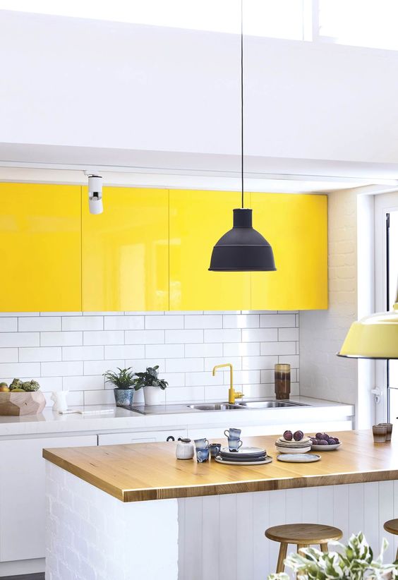 High-Gloss Yellow Cabinets Add a Pop of Color