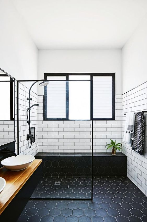 Hexagonal Black Floor Tiles Create a Grounding Foundation