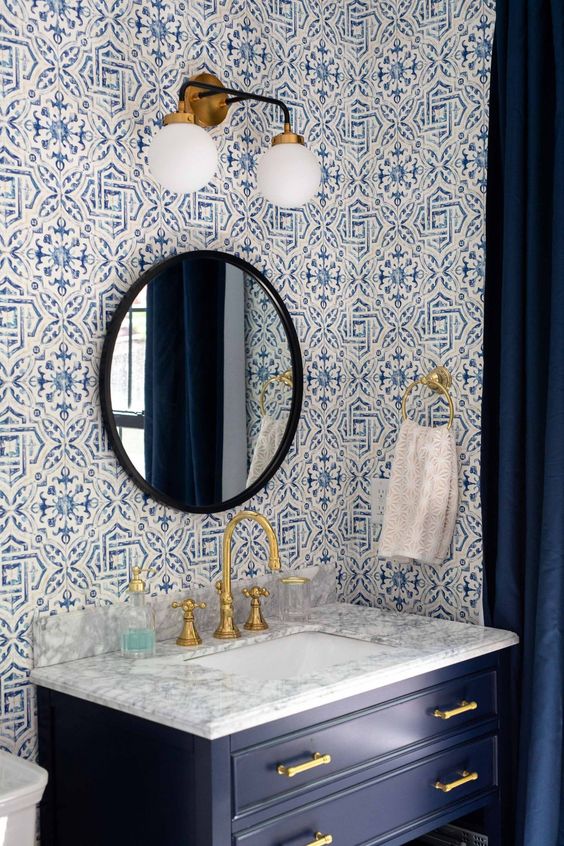 Glamorous Wallpaper Paired with Gold Fixtures