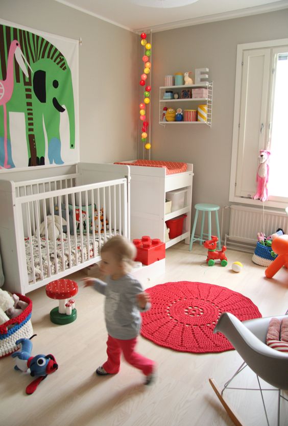 Anchor Your Play Area with a Bright Red Round Rug