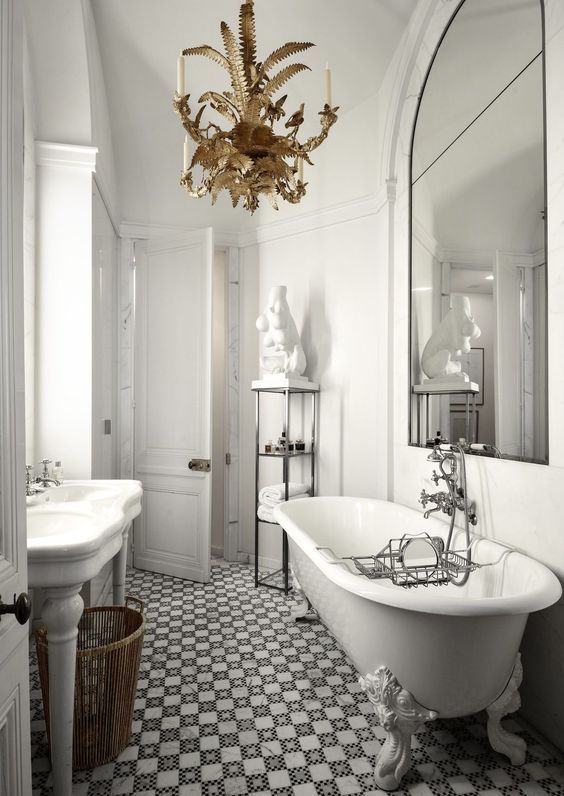 Sculptural Pedestal Displays Art Near the Tub