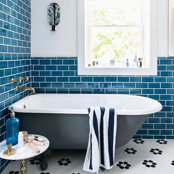 Deep Blue Subway Tile Walls Create a Watery Shower Enclosure