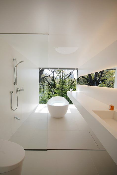 Let a White Oval Tub Float in a Sunlit Space