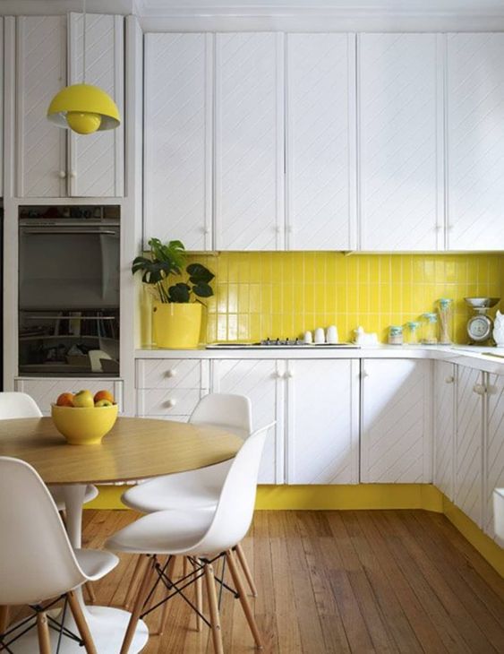 Sunny Yellow Baseboard Grounds White Cabinets