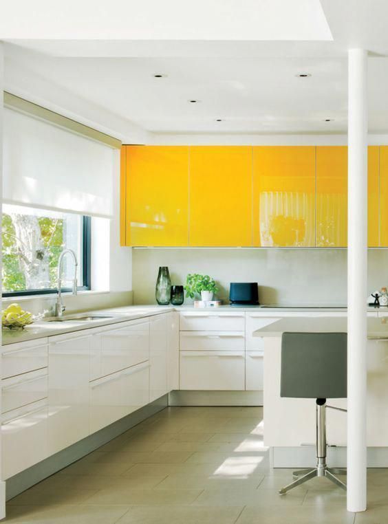 High-Gloss Yellow Upper Cabinets Brighten the Space