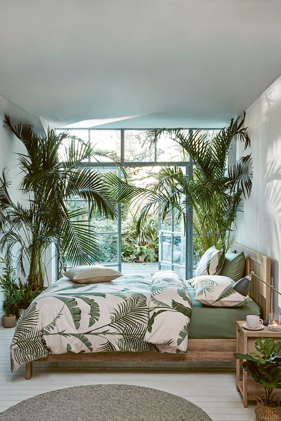 Towering Plants Frame Your Bed For a Greenhouse Feel