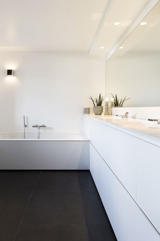 Bring Life to a Minimalist Vanity with Tall Green Plants