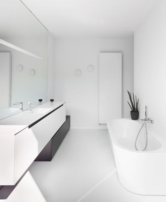 Floating Vanity With Dark Base Creates Visual Depth