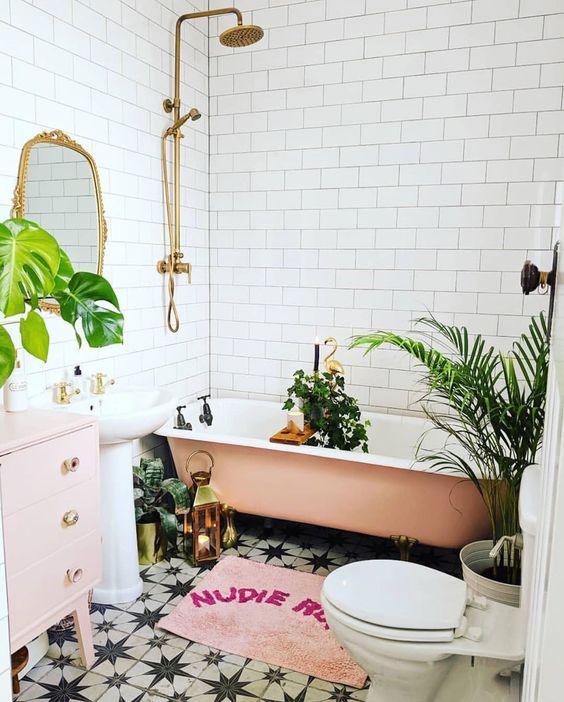 Gold Shower Fixtures Add Vintage Glamour to Subway Tile