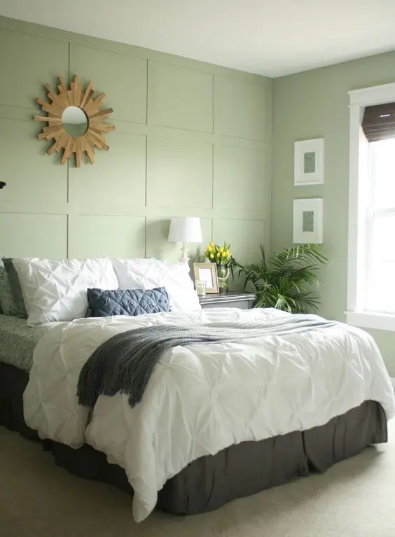Sunburst Mirror Adds Natural Wood Accent Above Headboard