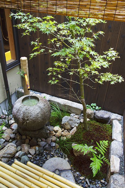 Stone Basin Water Feature with a Bamboo Spout