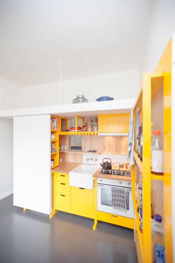 Yellow Open Shelving Units Frame Your Kitchen Space