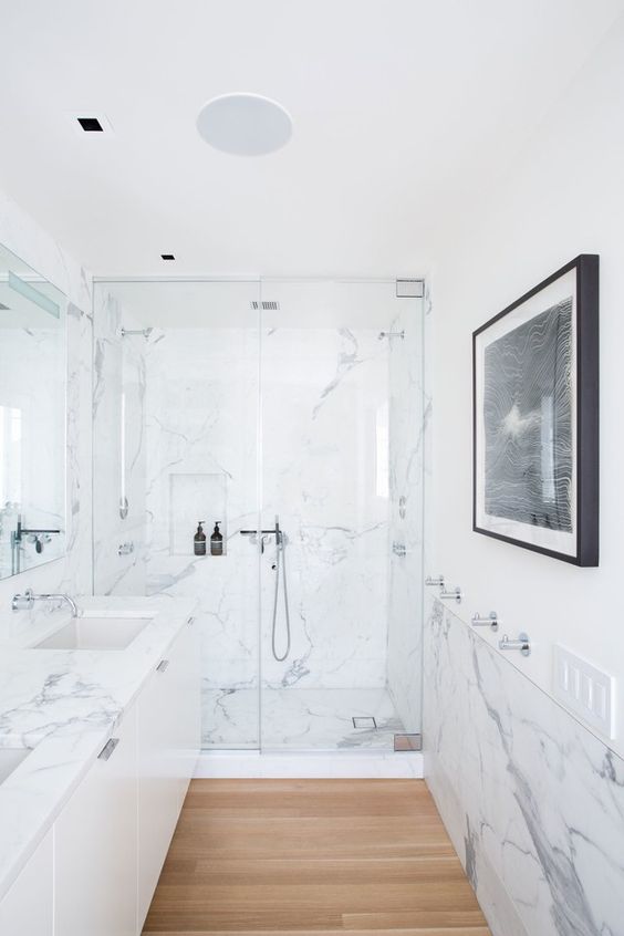 Framed Abstract Art Adds a Graphic Element to Marble Walls
