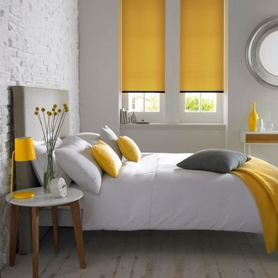 Bright Yellow Roller Blinds Frame the Windows
