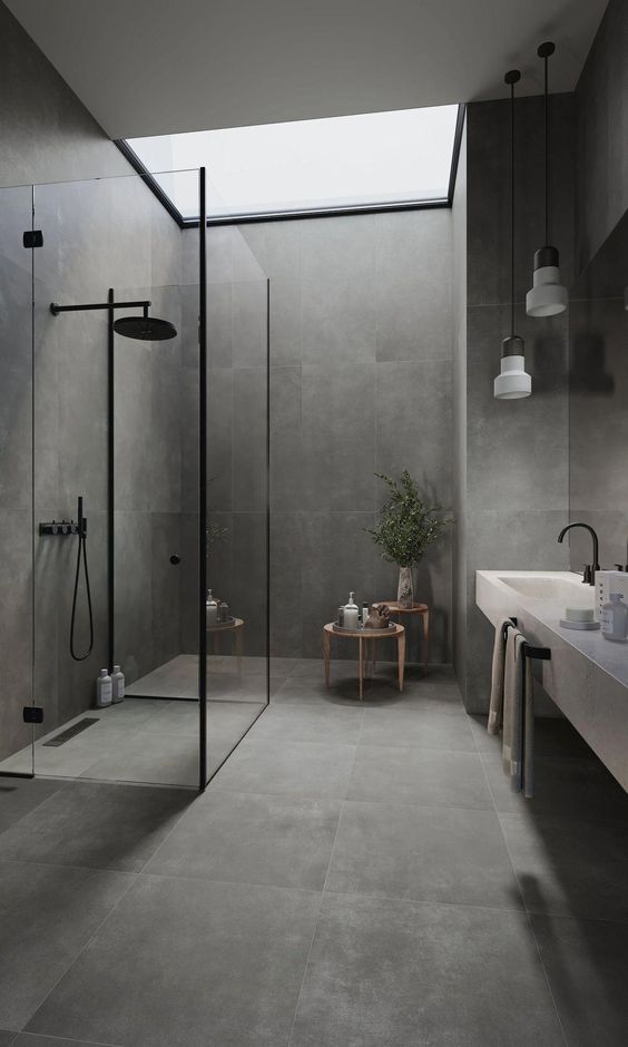 Narrow Wooden Tables Add Warmth Beside the Shower
