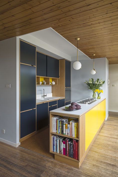 Built-In Island Bookshelves Keep Cookbooks Handy