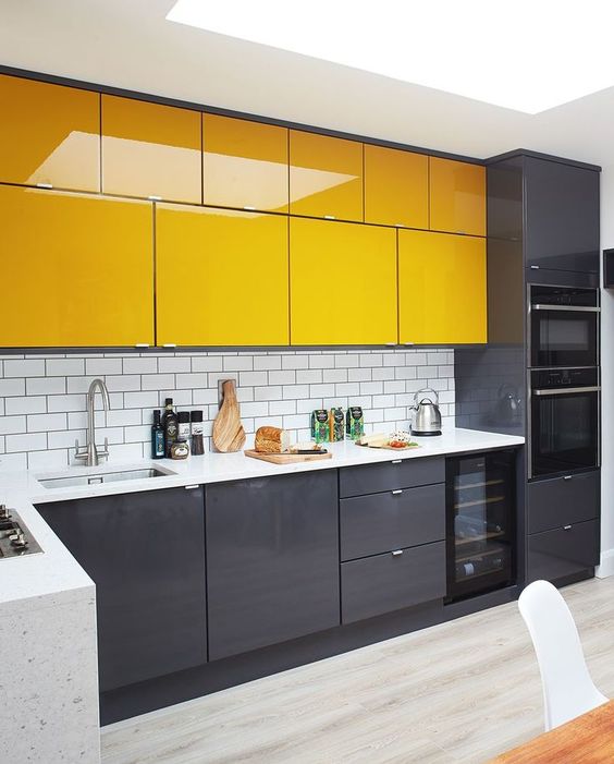 High-Gloss Yellow Cabinets Create a Bright, Modern Kitchen