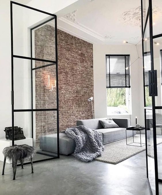 Define Open Spaces with Glass and Black Metal Dividers