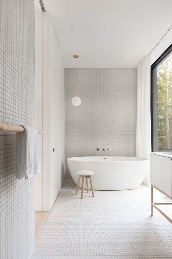 Place a Wooden Stool Beside the Tub for a Natural Touch