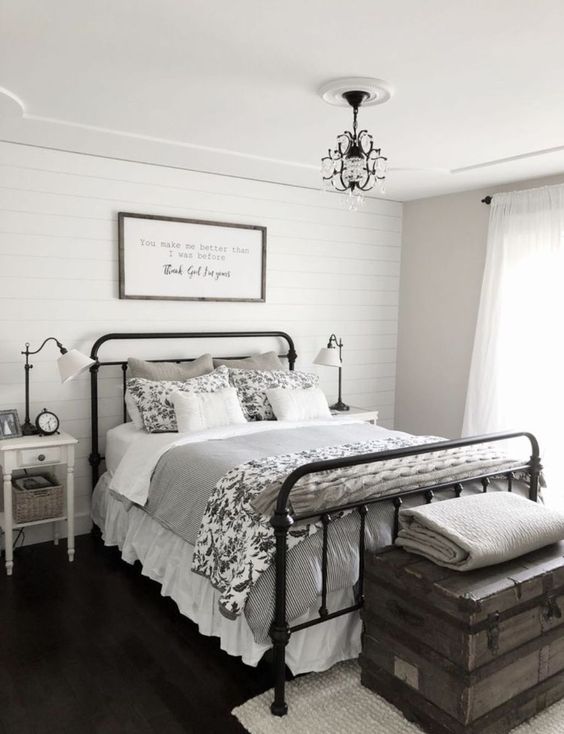 Vintage Trunk Adds Layered Storage and Character at Foot of Bed
