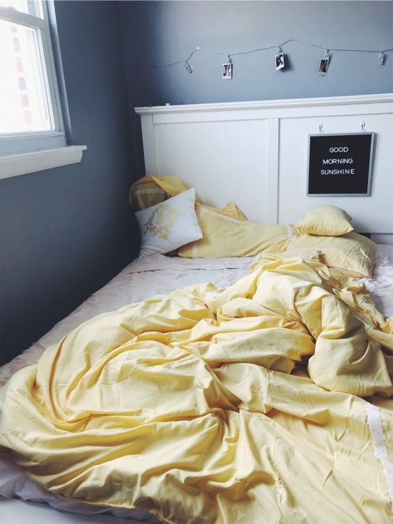 Yellow Duvet Adds a Cheerful Layer to a Grey Bedroom