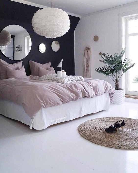 Round Jute Rug Grounds the Bedroom Floor