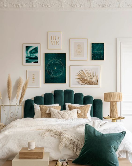 Gallery Wall of Celestial and Nature Art Above Bed
