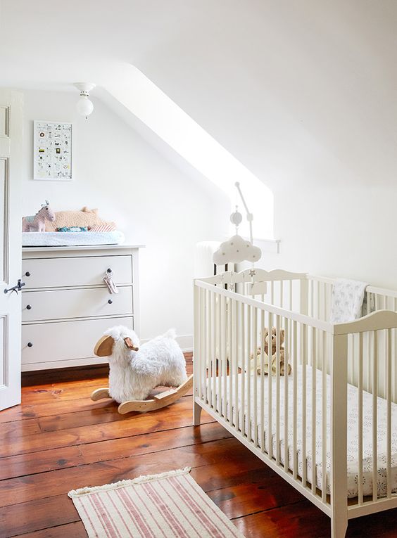 White Crib with Cloud Mobile Adds Whimsical Touches